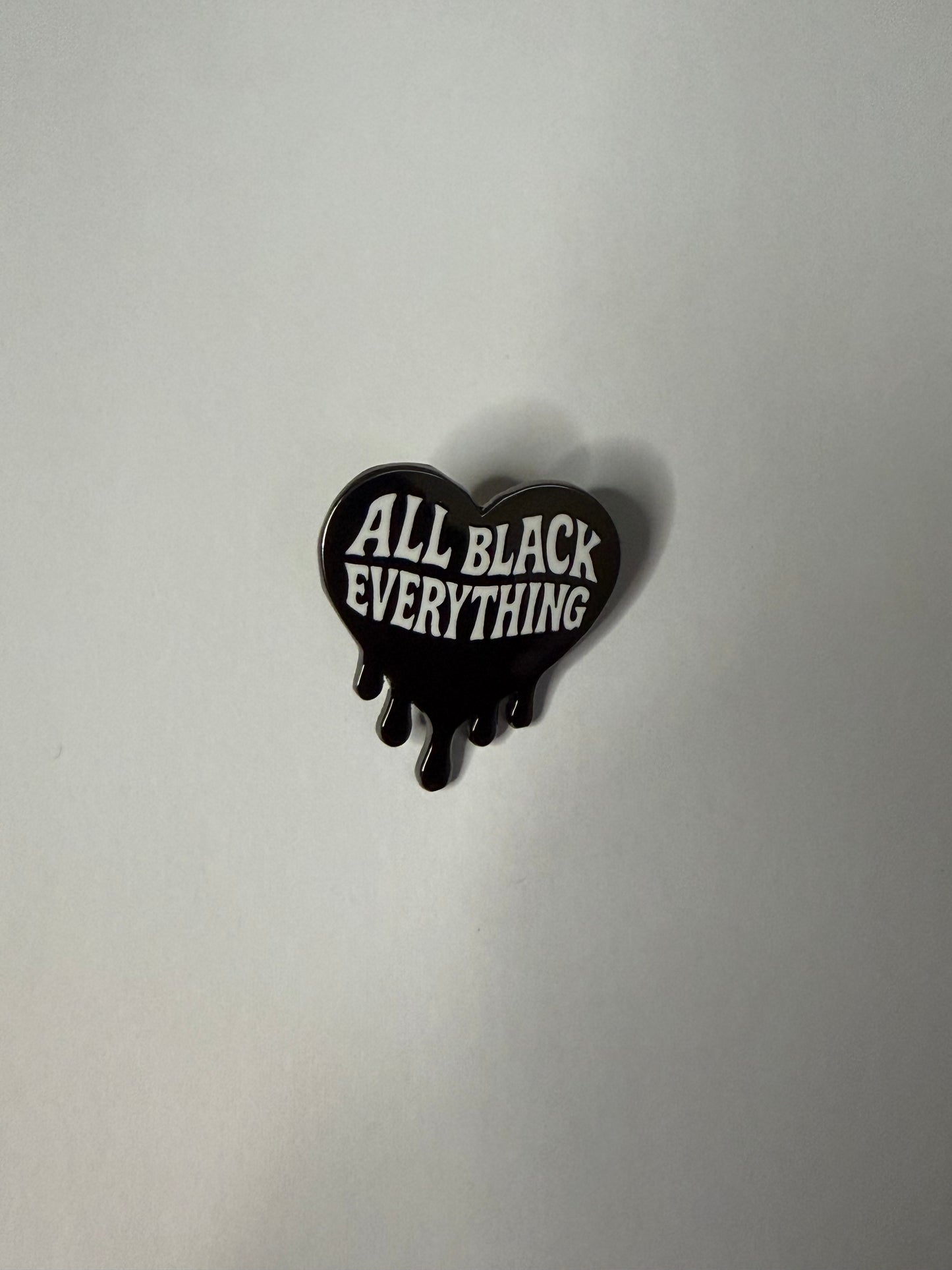 All black everything black heart enamel pin