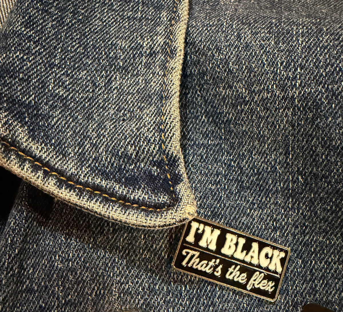 I'm black that's the flex enamel pin