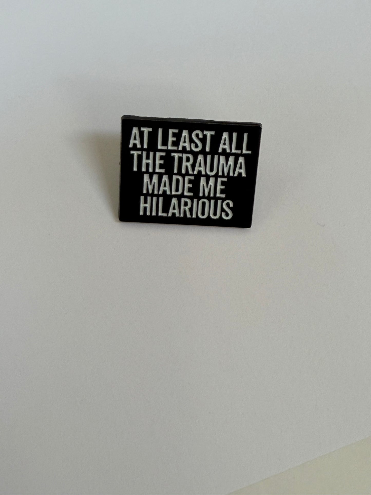 Trauma enamel pin