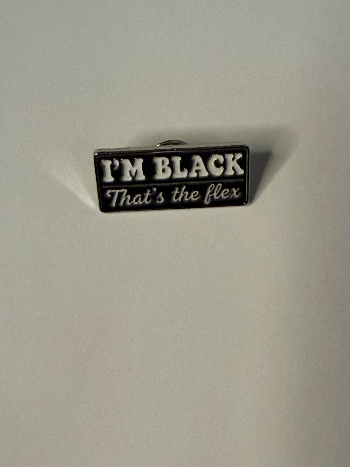 I'm black that's the flex enamel pin